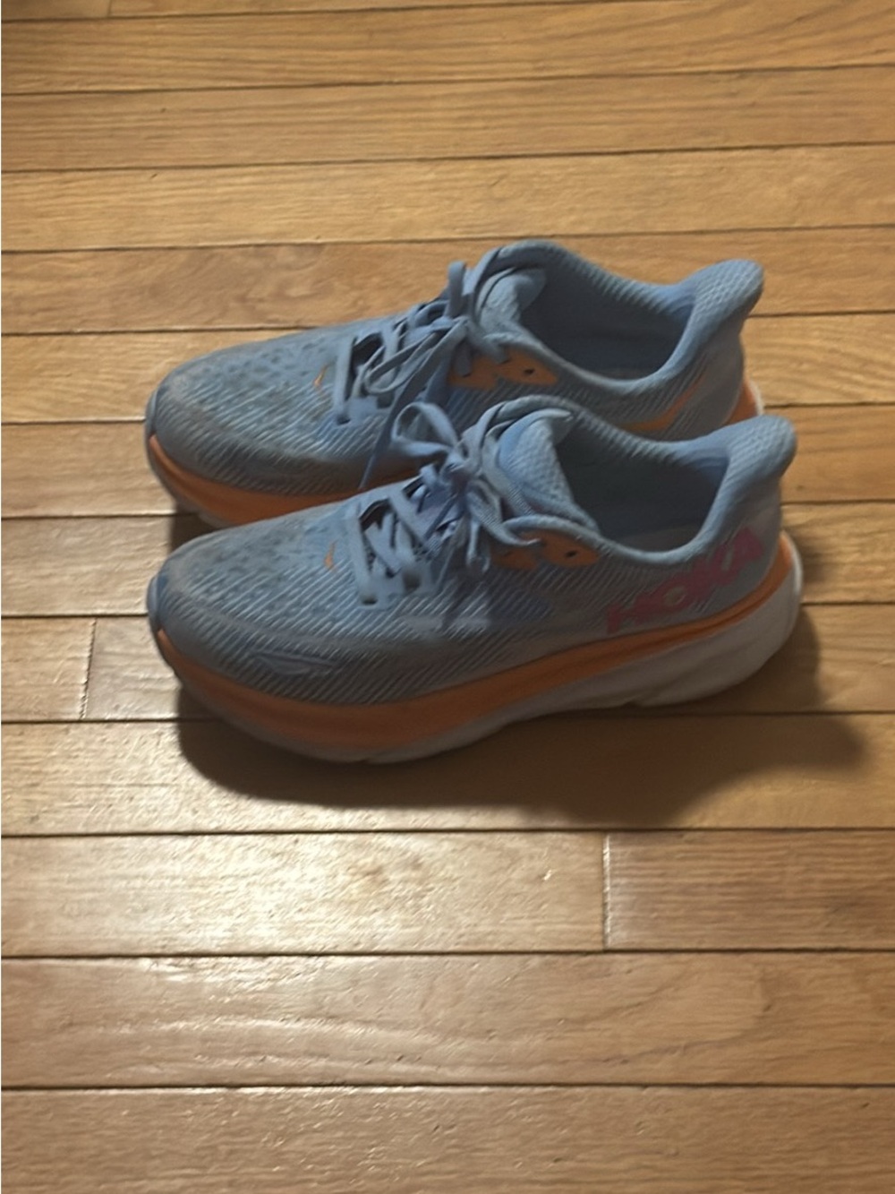 Hoka women’s  Light Blue and Orange Athletic Sneakers. Size 7.5